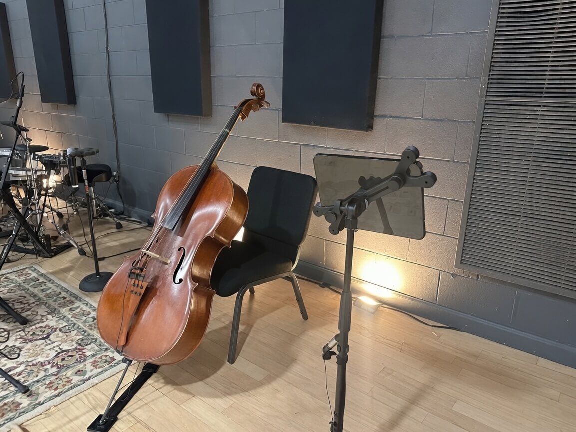 Cello on a stand in the studio